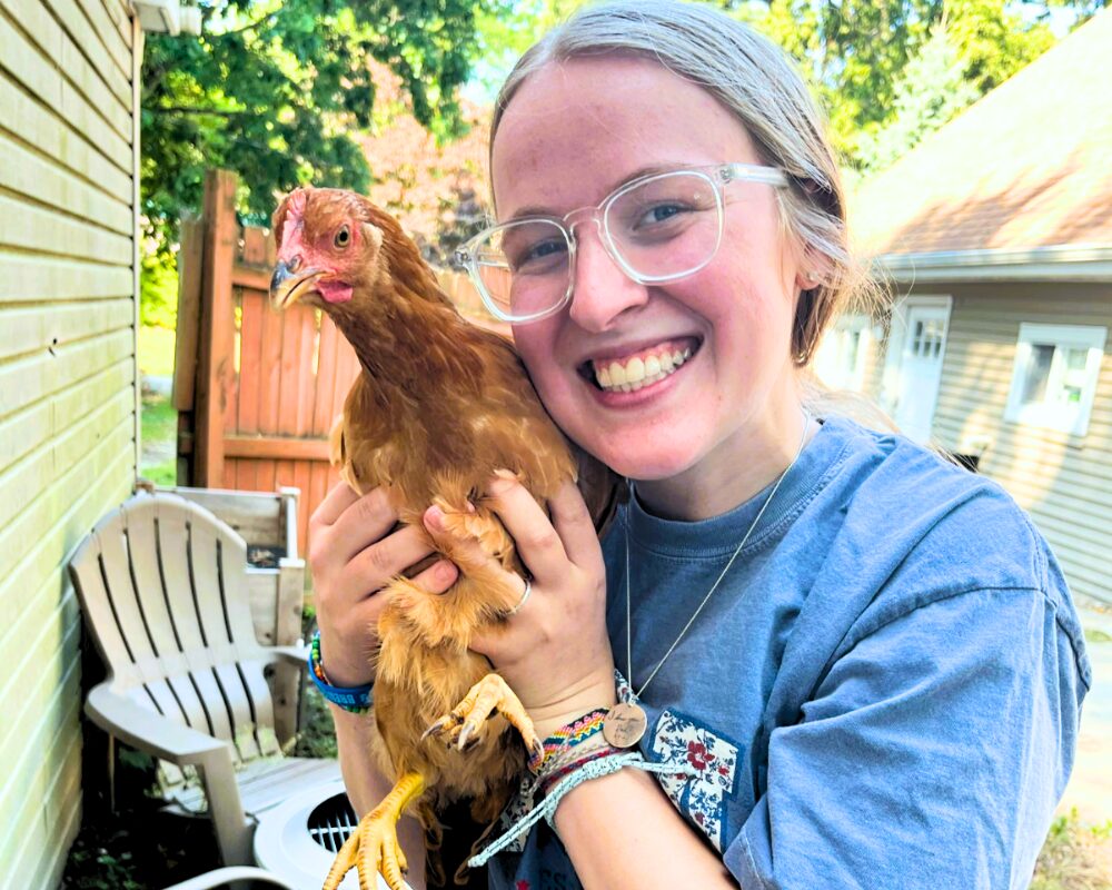 MI IMPACT cluck chicken event kids alternative schooling Michigan-2 Kids with chickens at the MI-IMPACT Cluck Cluck Coop event in Michigan